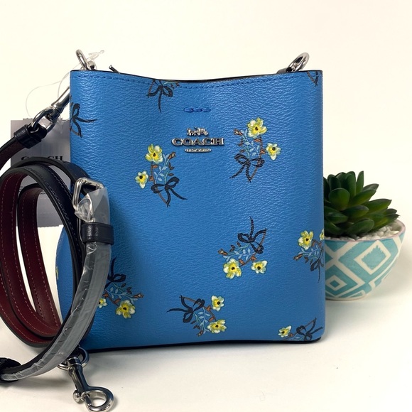 Coach Handbags - COACH Mini Town Bucket Crossbody Bag With Floral Bow Print in Blue